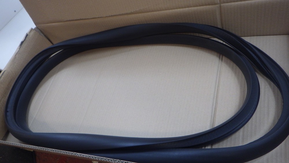 Tesla Model Y door seal left front on body genuine new 1497673