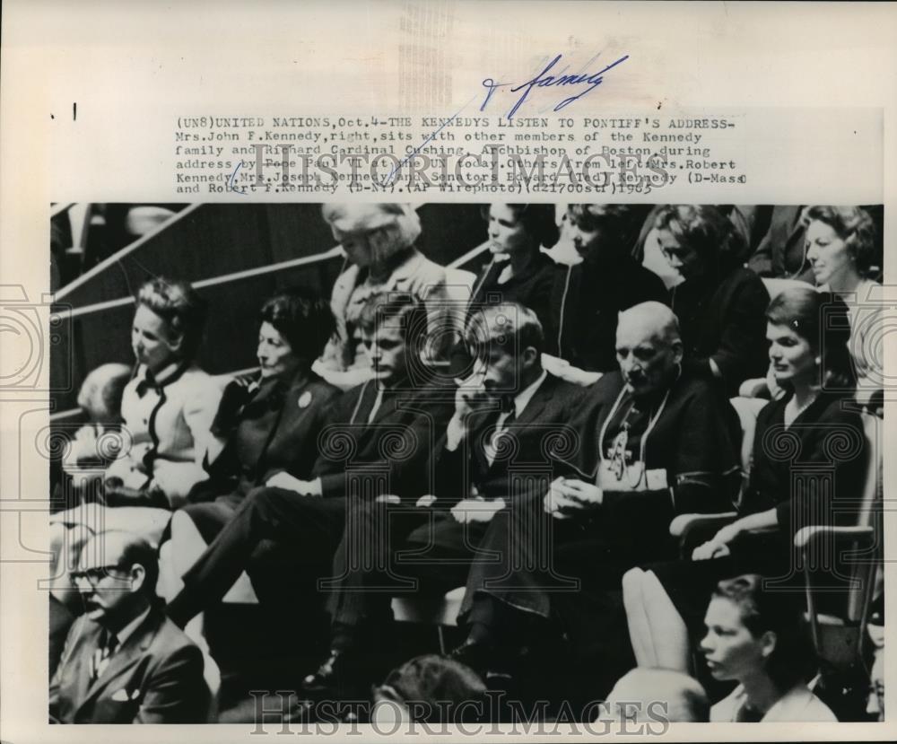 1965 Press Photo members of Kennedy family listen to Archbishop address, Boston