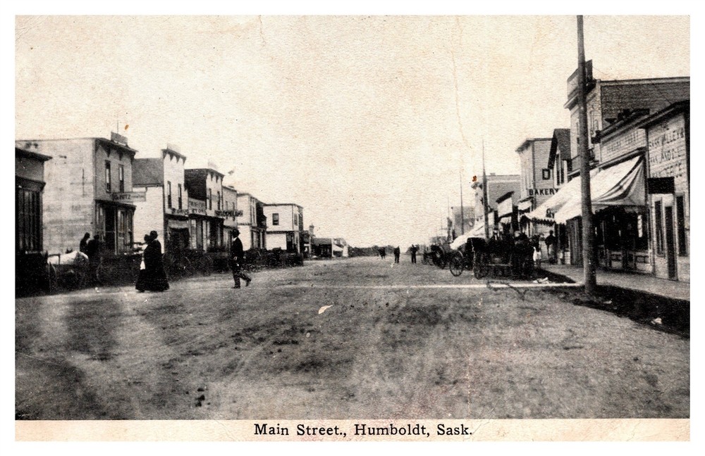 Main Street Horse Wagon Cars Stores Humboldt Saskatchewan Can C1913 Postcard AG5