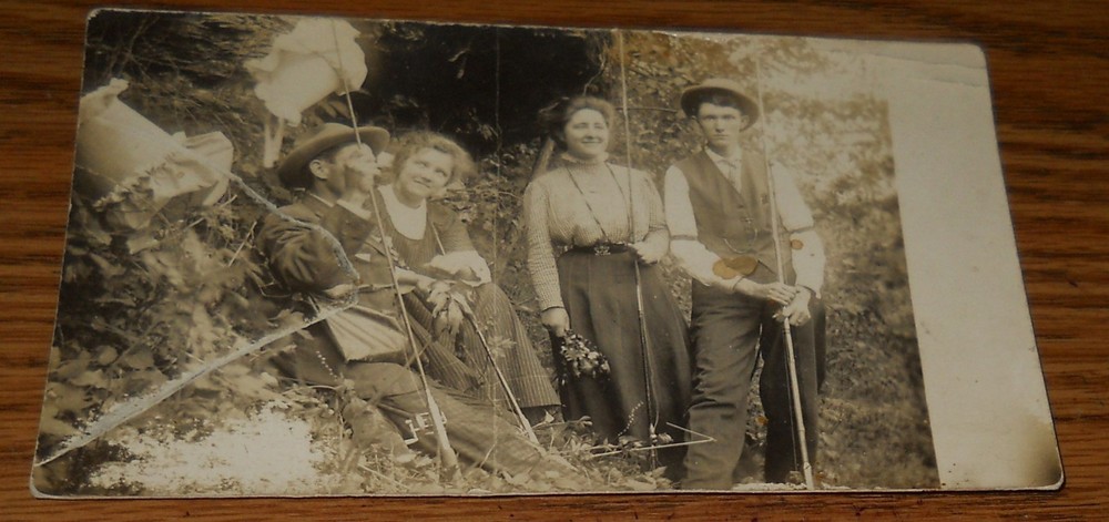 1910 Real Photo Postcard~Couples Fishing Bonnets Hanging on Trees