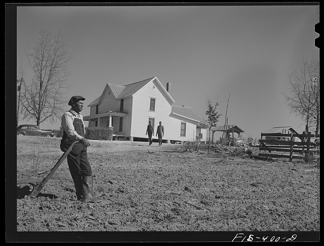 Photo:Zebulon North Carolina Feggen Jones on Plow in Field Near House 1942