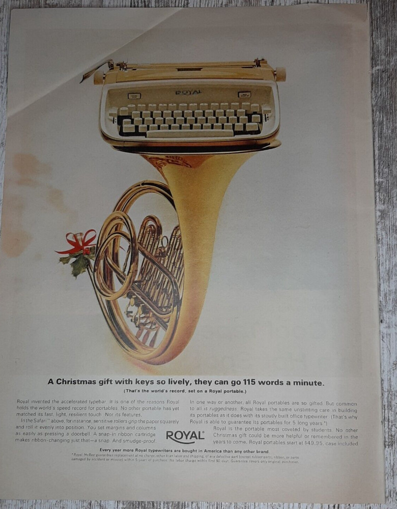 1963 Royal Vintage Print Ad Typewriter Portable Safari French Horn Christmas Bow