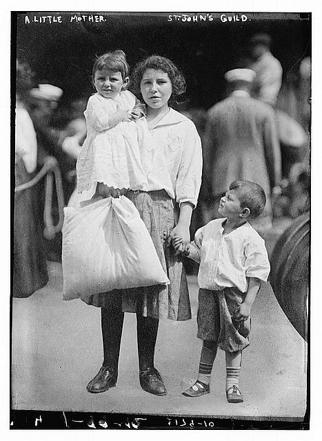 Photo:St. John's Guild Little Mother Children Holding Bag Bain News 1900s