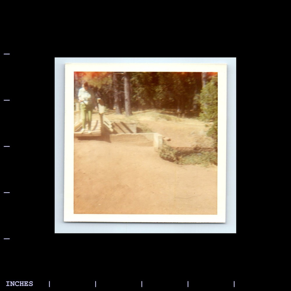 Square Color Photo MAN STANDING OUTSIDE